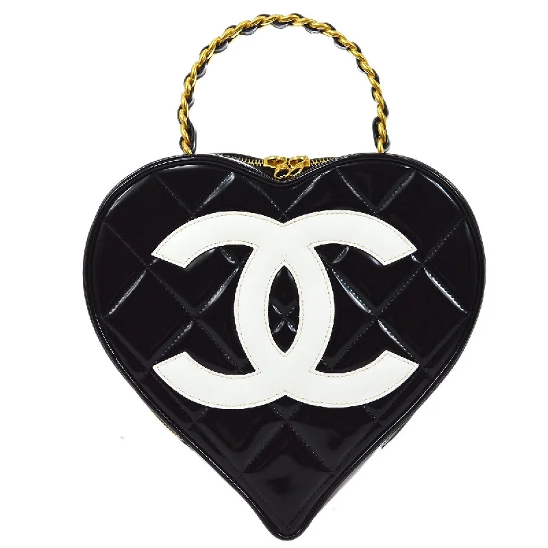 Chanel Quilted Leather Shoulder Bag for FashionistasCHANEL  Black Patent Leather Heart vanity bag 92930