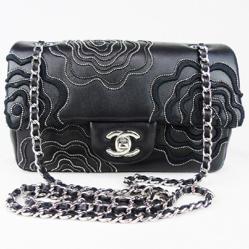 Chanel Black Handbag for Business MeetingsCHANEL 'Follies' black flap bag