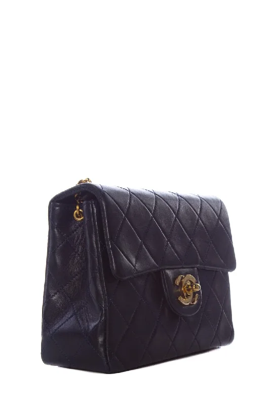 Chanel Quilted Leather Shoulder Bag for FashionistasChanel Navy Lambskin Quilted MIni Flap GHW  Handbag