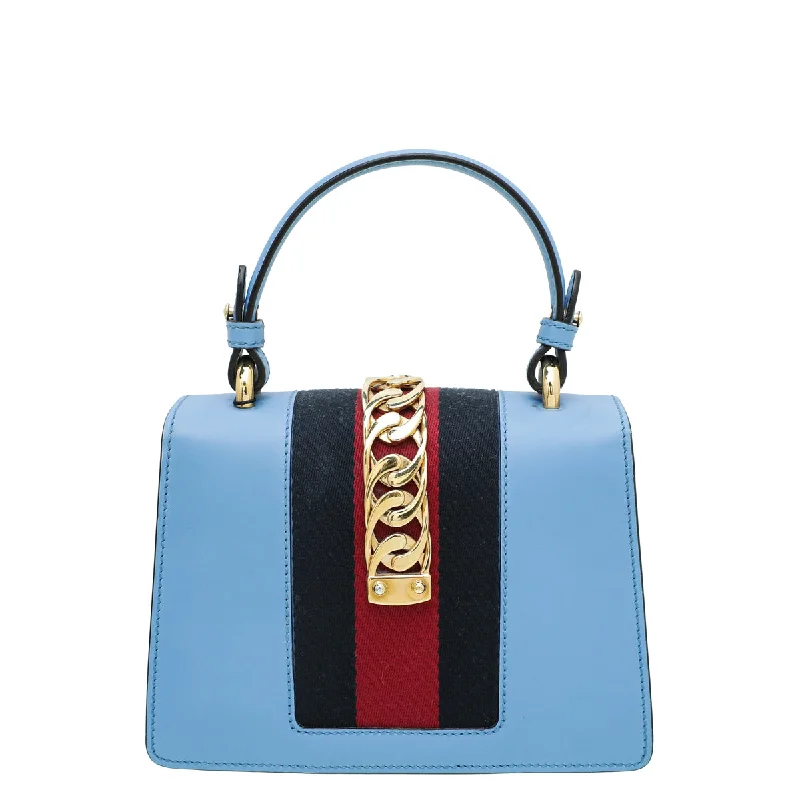 Women Gucci Sylvie bags with a leather - wrapped handleGucci Blue Sylvie Top Handle Mini Bag