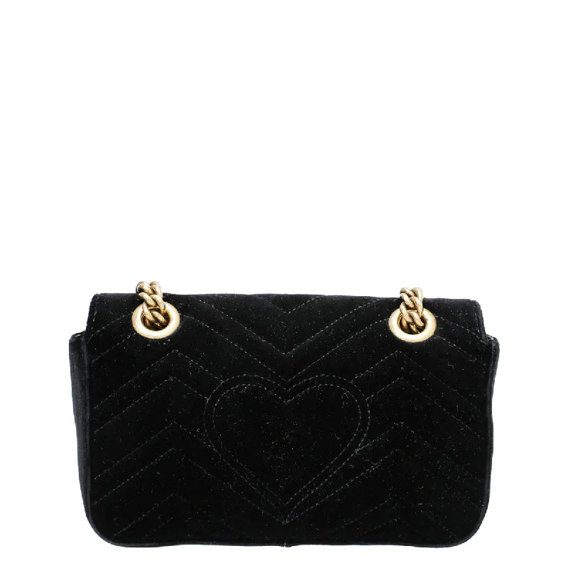 Women Gucci Sylvie bags with a crystal - embellished web stripeGucci Black Velvet GG Marmont Mini Bag