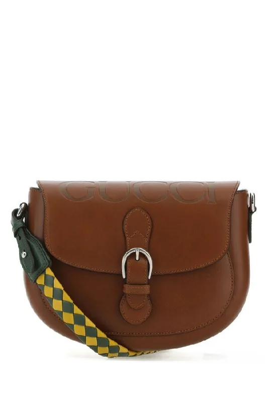 Gucci Marmont bags for women with a contrast - colored interiorGucci Woman Brown Leather Shoulder Bag