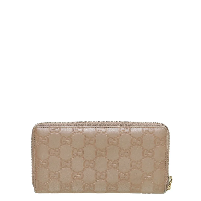 Women Gucci Sylvie bags with a leather - wrapped handleGucci Rose Beige GG Guccissima Zip Around Lovely Wallet