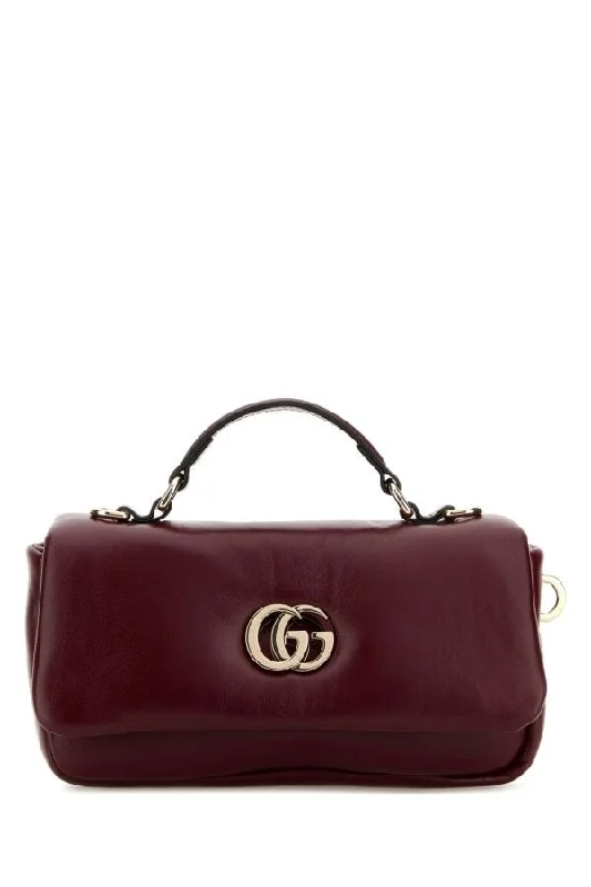 Women Gucci crossbody bags with a woven leather strapGucci Woman Burgundy Leather Handbag