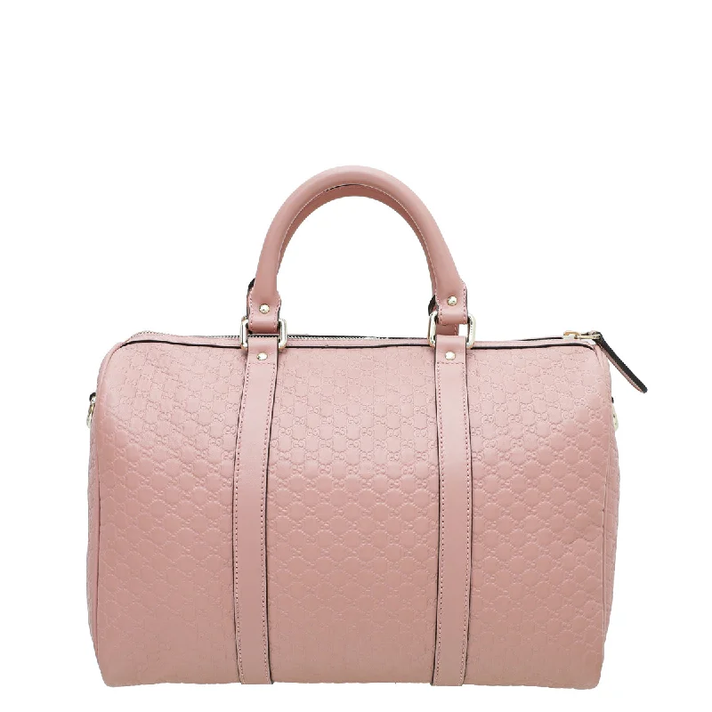 Gucci backpacks for women with a sleek silhouetteGucci Dusty Pink GG Microguccissima Joy Boston Medium Bag