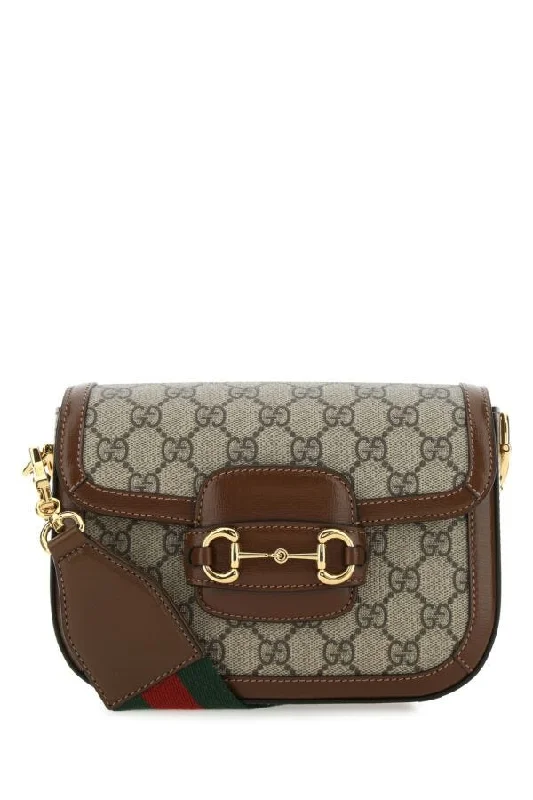 Gucci Marmont bags for women with quilted leather exteriorsGucci Woman Gg Supreme Fabric And Leather Mini Horsebit 1955 Crossbody Bag