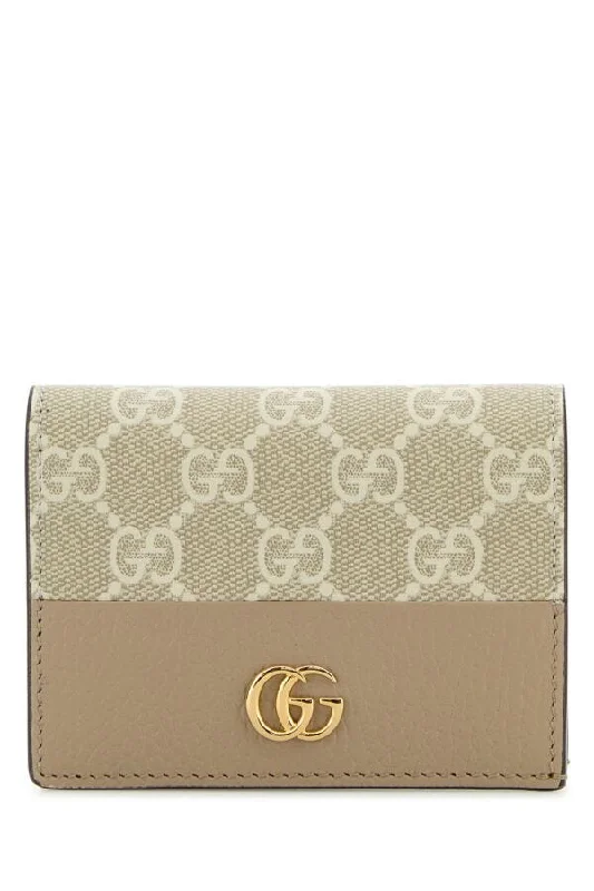 Gucci crossbody bags for women with adjustable leather strapsGucci Woman Gg Supreme Fabric And Leather Gg Marmont Wallet