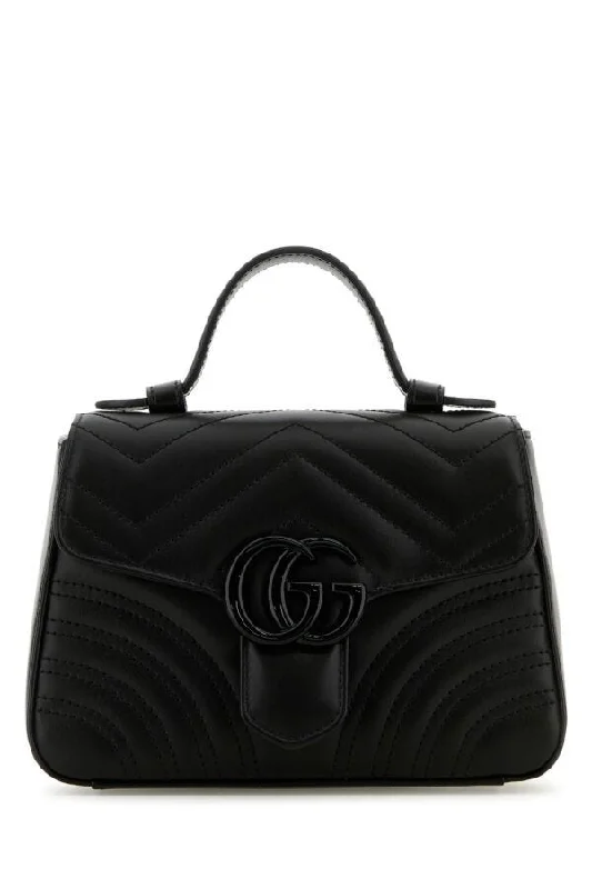 Women Gucci bags with a zippered interior pocketGucci Woman Black Leather Marmont Handbag