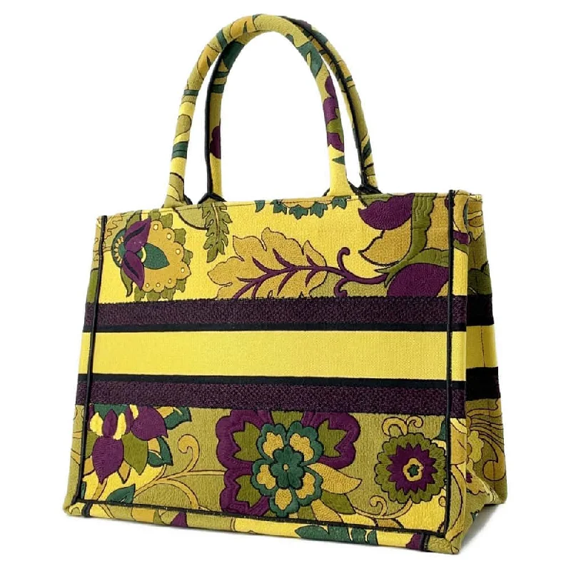 Contemporary Christian Dior handbags with a unique shapeDior Book tote Yellow/Multicolor Canvas Size Medium