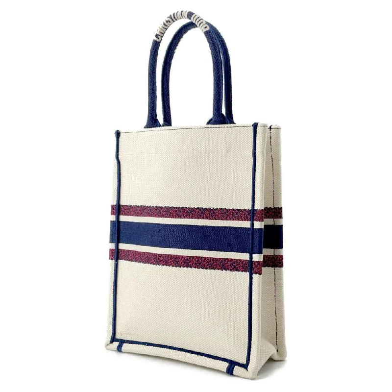 Trendsetting Christian Dior crossbody bags with a colorful strapDior book tote vertical Ivory/Navy/Red Canvas Size Mini