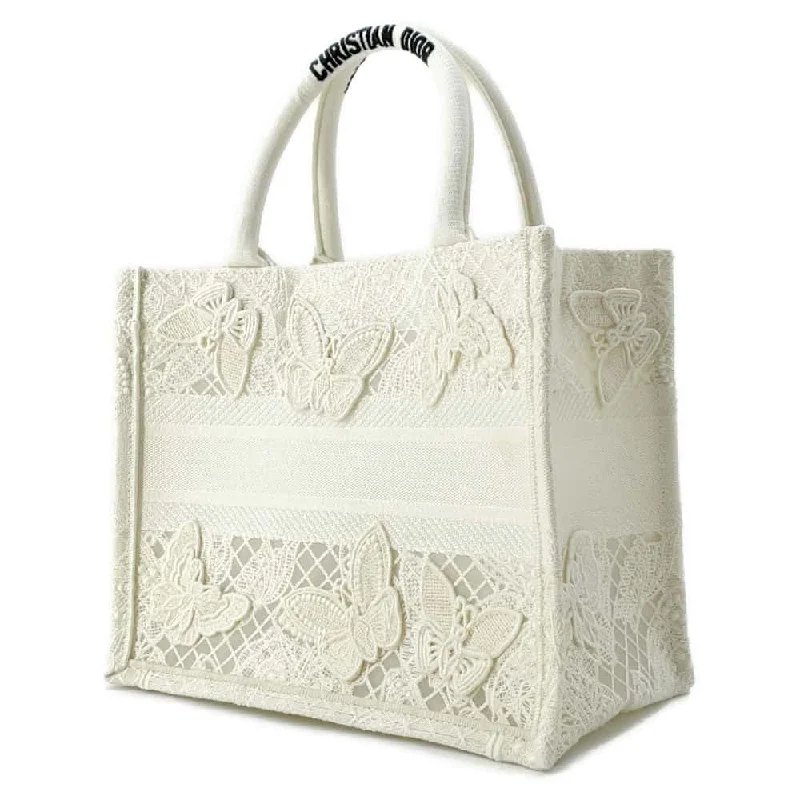 Christian Dior handbags with a snap - button closure and a decorative buckleDior Book Tote Butterfly Embroidery White Canvas Size Small