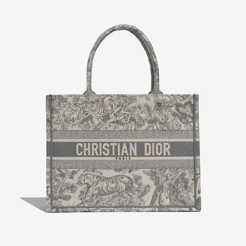 Christian Dior bags with a side - pocket for holding a water bottleDior Book Tote Medium Canvas Bag