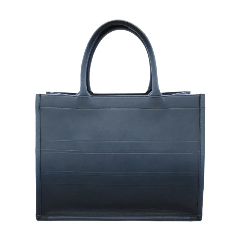 Christian Dior backpacks with a sleek, minimalist silhouetteDior Book Tote Medium Tote Bag Blue leather