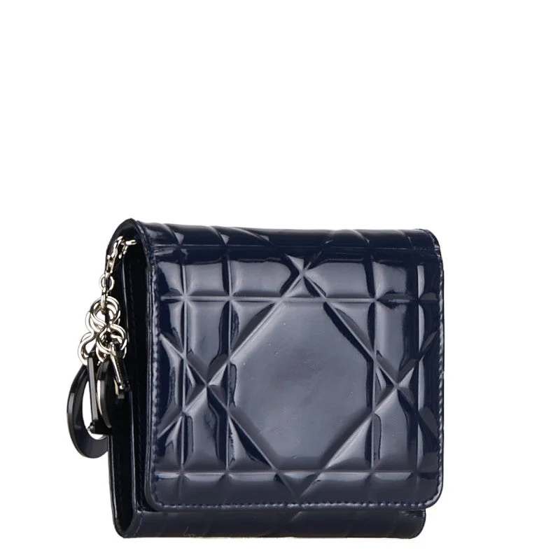 Christian Dior bags with a zip - top closure and multiple compartmentsDior Canarium Three Fold Wallet Navy Patent Leather  Dior