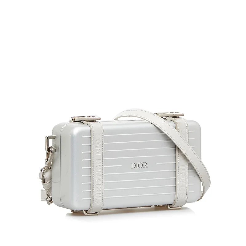 Christian Dior Saddle bags with a studded trim for a bold lookDior Dior x Rimowa Personal Utility Case (AancJw)