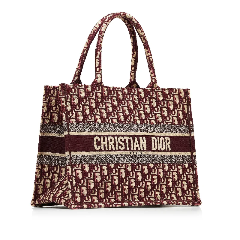 Christian Dior Saddle bags with a patent leather finish for a shiny lookDIOR Medium Oblique Book Tote Tote Bag