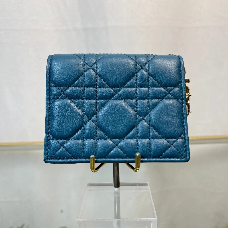 Christian Dior bags with a zip - top closure and multiple compartmentsDior Mini Lady Dior Gardenia Deep Ocean Wallet