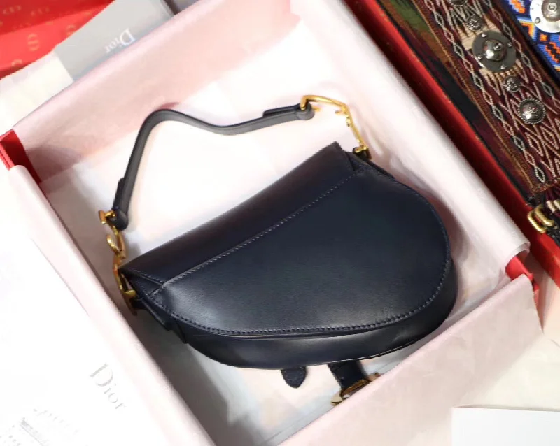 Christian Dior handbags with a detachable mirror for on - the - go touch - upsDior Mini Saddle Bag In Blue Calfskin