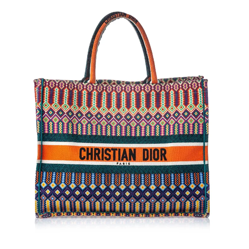 Christian Dior backpacks with a sleek, minimalist silhouetteDior Multi Canvas Fabric Embroidered Book Tote ITALY