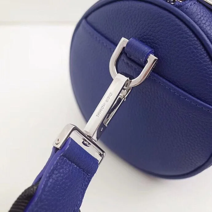 Christian Dior handbags with a snap - button closure and a decorative buckleDior Roller Pouch In Blue Grained Calfskin