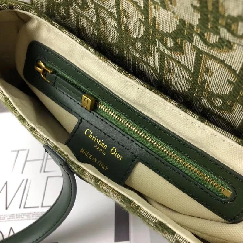 Christian Dior bags with a side - pocket for holding a water bottleDior Saddle Bag In Green Oblique Jacquard Canvas