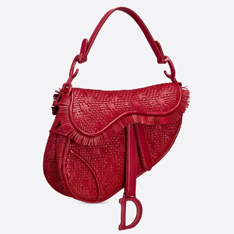 Trendsetting Christian Dior crossbody bags with a colorful strapDior Saddle Bag In Red Braided Leather Strips With Fringe