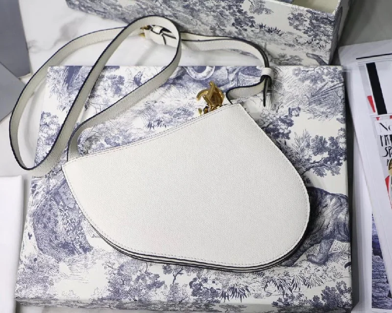 Christian Dior handbags with a snap - button closure and a decorative buckleDior Saddle Trio Pouch With Strap In White Calfskin