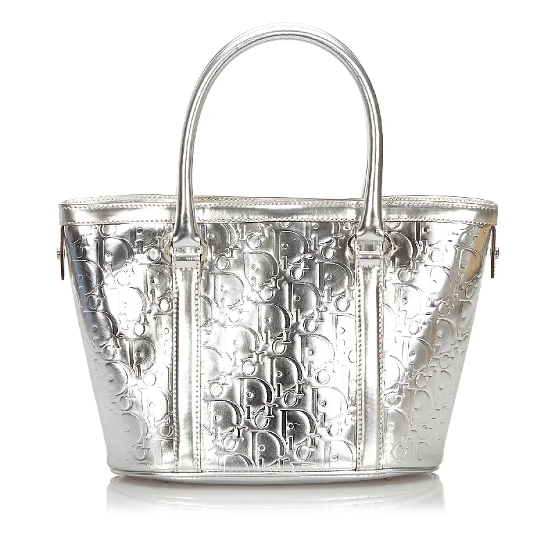 Christian Dior Saddle bags with a studded trim for a bold lookDior Silver Patent Leather Oblique Tote Bag France