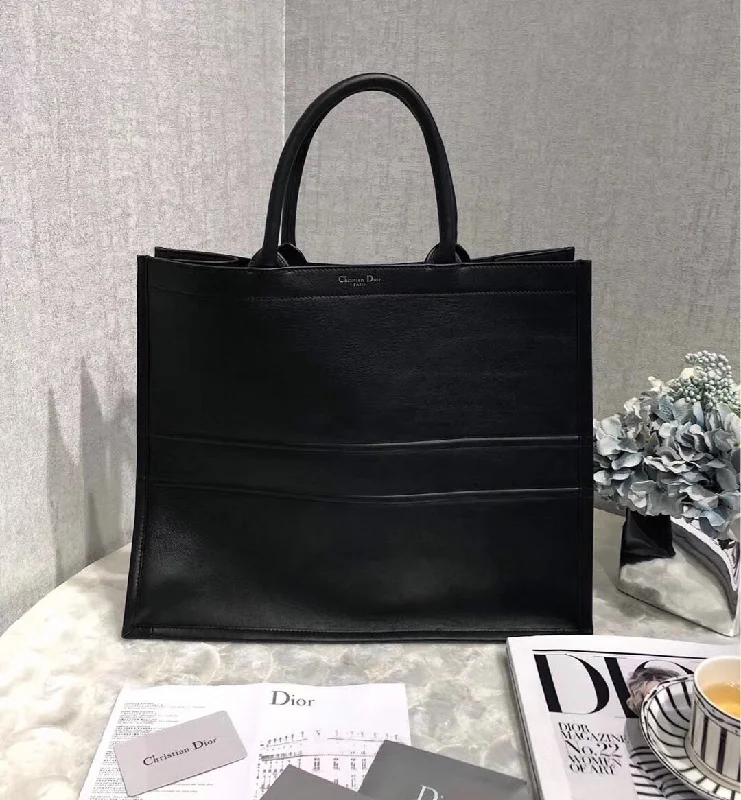 Contemporary Christian Dior handbags with a unique shapeDior Surrealism Book Tote In Black Printed Calfskin