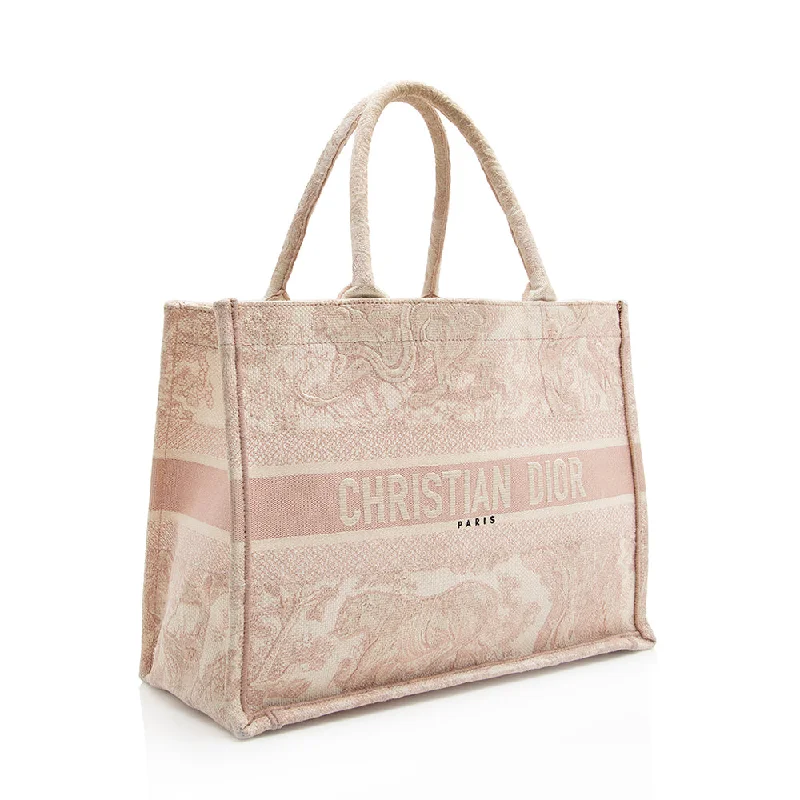 Christian Dior tote bags with a printed Dior logo on the frontChristian Dior Toile De Jouy Small Book Tote