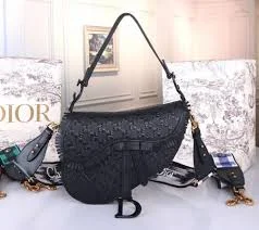 Christian Dior handbags with a back - pocket for quick storageDior Saddle Bag In Black Braided Leather Strips With Fringe